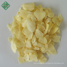 Pure white color dehydrated garlic flakes without roots